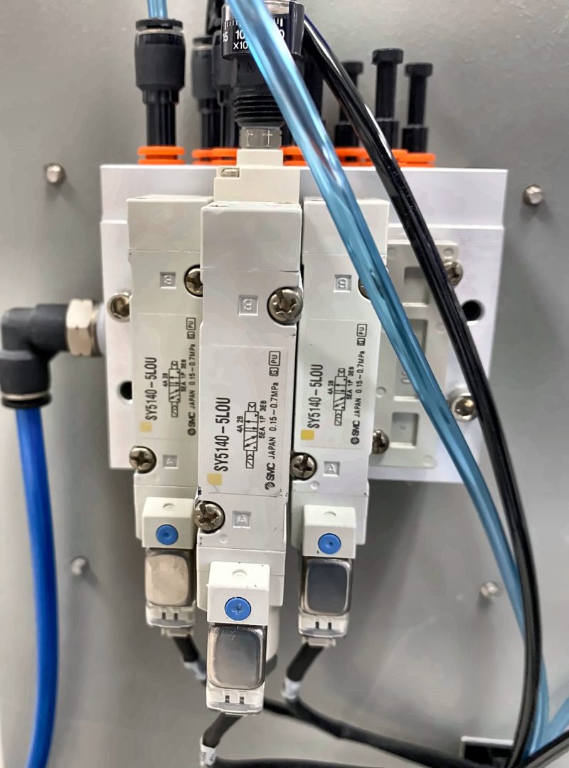 Bank of pneumatic valves on a manifold with neatly routed air lines